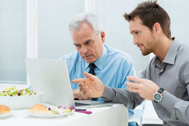 two men on computer